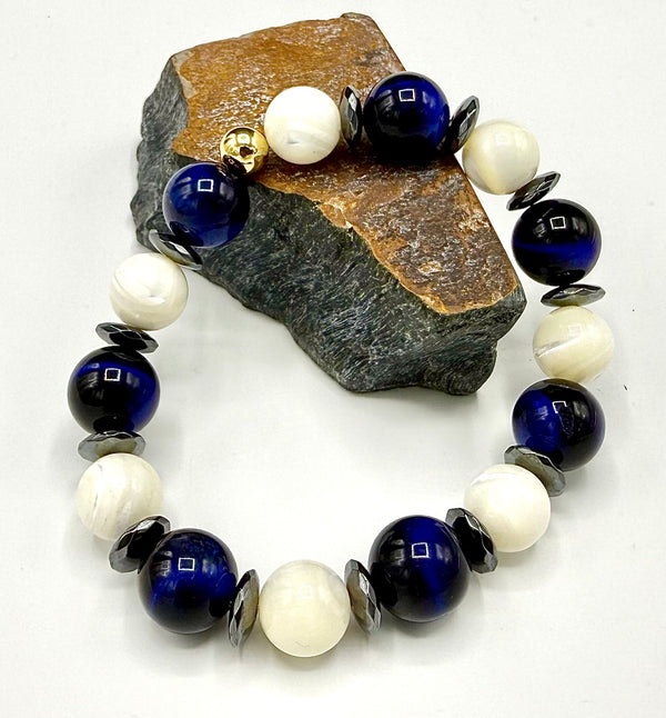 Blue tiger eye bracelet with dyed pearls from STICS and STONES, showcasing a stylish jewelry accessory with vibrant stones.