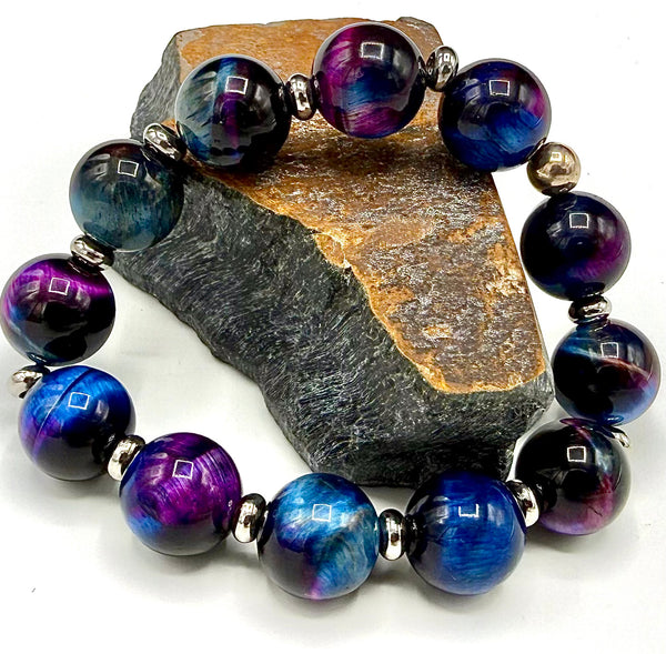 Multicolored dyed Tiger Eye bracelet from STICS and STONES featuring polished beads and an adjustable string for stylish wear.