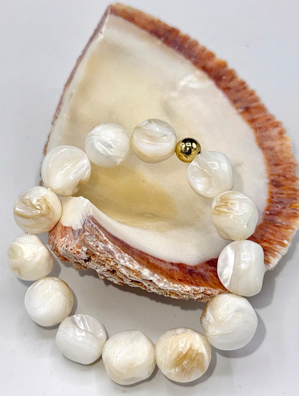 Round rough pearl bracelet by STICS and STONES featuring natural, textured pearl beads on a delicate jewelry bracelet.