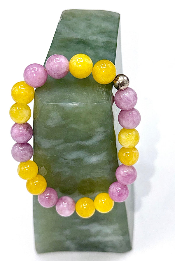 Yellow jade and strawberry quartz bracelet featuring polished beads, crafted by STICS and STONES.