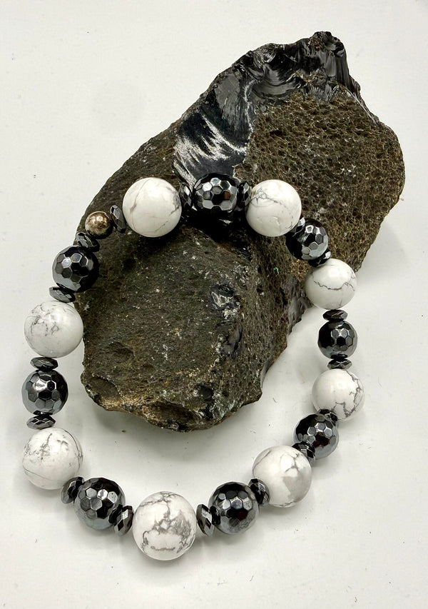 Howlite, Onyx, and Hematite bracelet by STICS and STONES featuring polished stones on an elastic band.