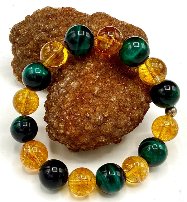 Citrine and emerald green tiger eye bracelet with beads, featuring natural gemstone stones on a stretchy cord.