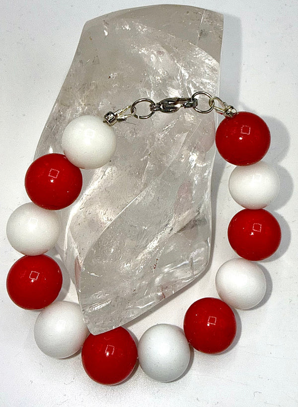 Red and bone bracelet from STICS and STONES featuring mixed materials and a stylish design.