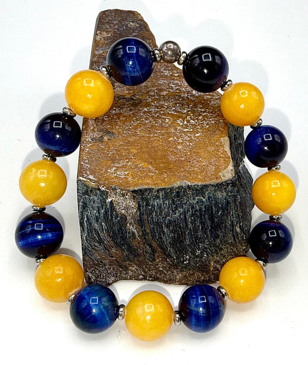Blue Tiger Eye and Yellow Calcite bracelet featuring polished stones on a stretchy band, crafted by STICS and STONES.