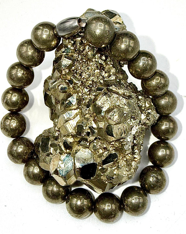 Pyrite bracelet by STICS and STONES featuring polished metallic gold-toned beads on an elastic band.