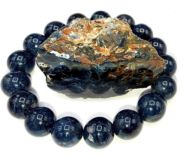 Pietersite bracelet featuring black and blue stones from STICS and STONES, showcasing a stylish, polished jewelry piece.
