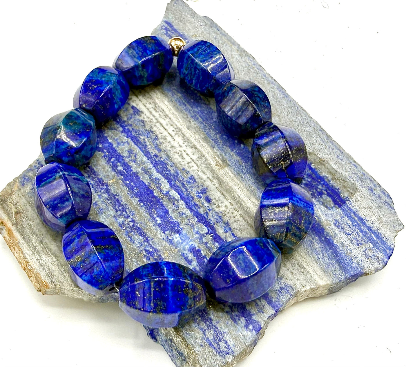Lapis Lazuli rectangle bracelet featuring deep blue stones with gold flecks, designed by STICS and STONES.