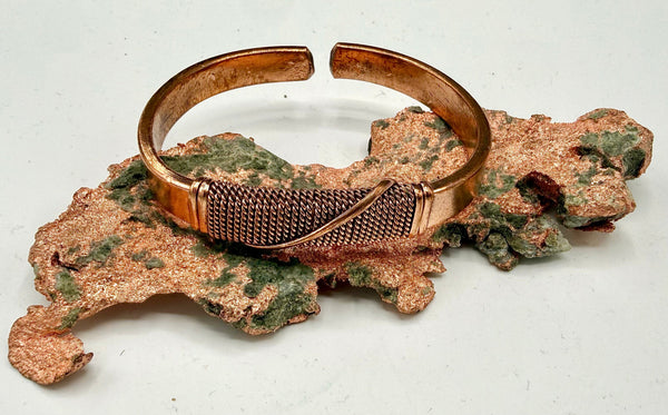 Copper round bracelet by STICS and STONES featuring smooth, polished copper links for a stylish accessory.