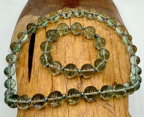 Green amethyst jewelry set featuring necklace and bracelet with matching stones, by STICS and STONES.