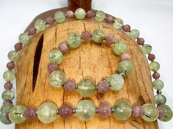Prehnite and Strawberry Quartz jewelry set featuring a necklace and bracelet with polished gemstones, crafted by STICS and STONES.
