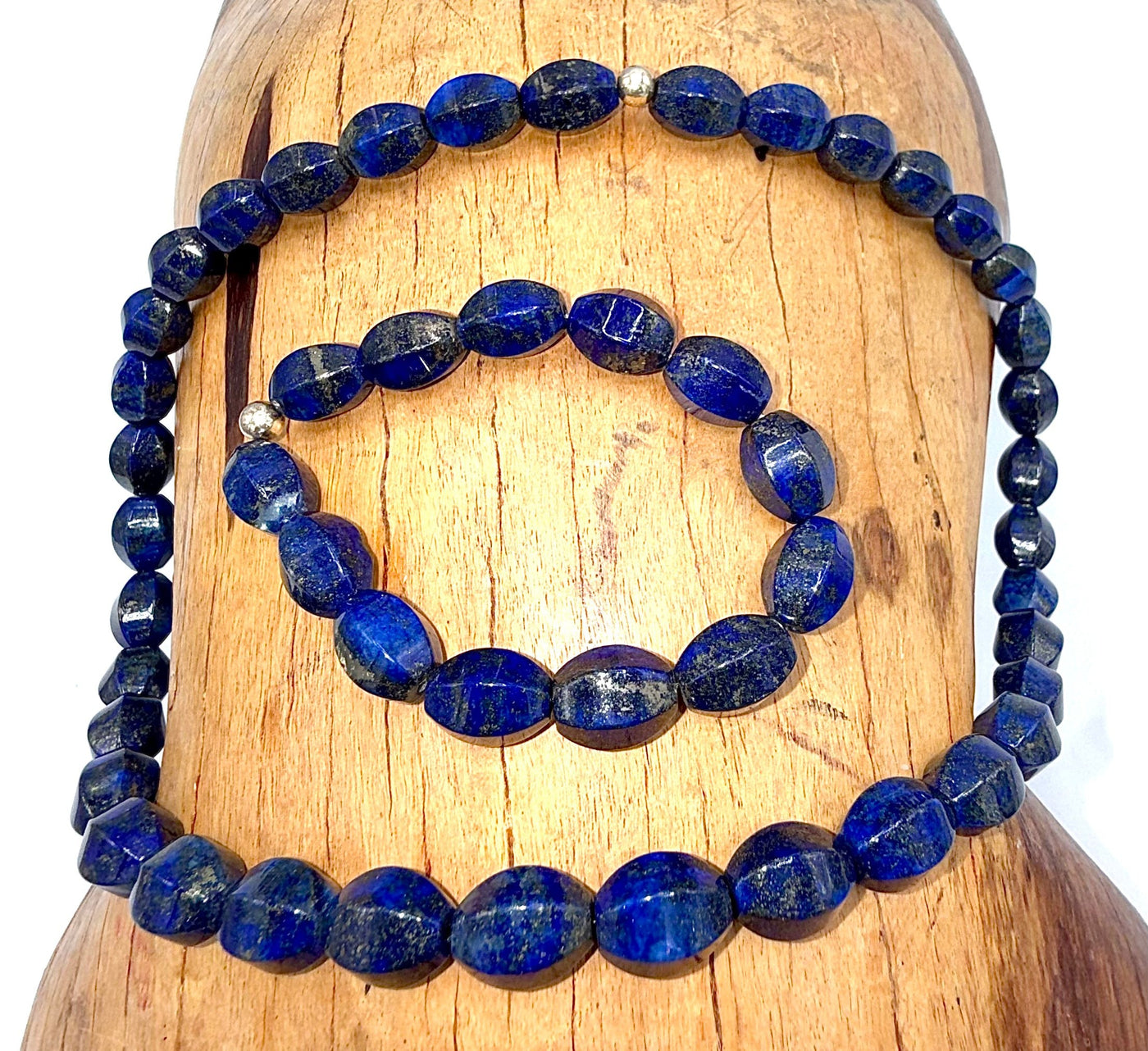 Lapis Lazuli rectangle necklace and bracelet jewelry set by STICS and STONES, featuring deep blue stones with gold accents.