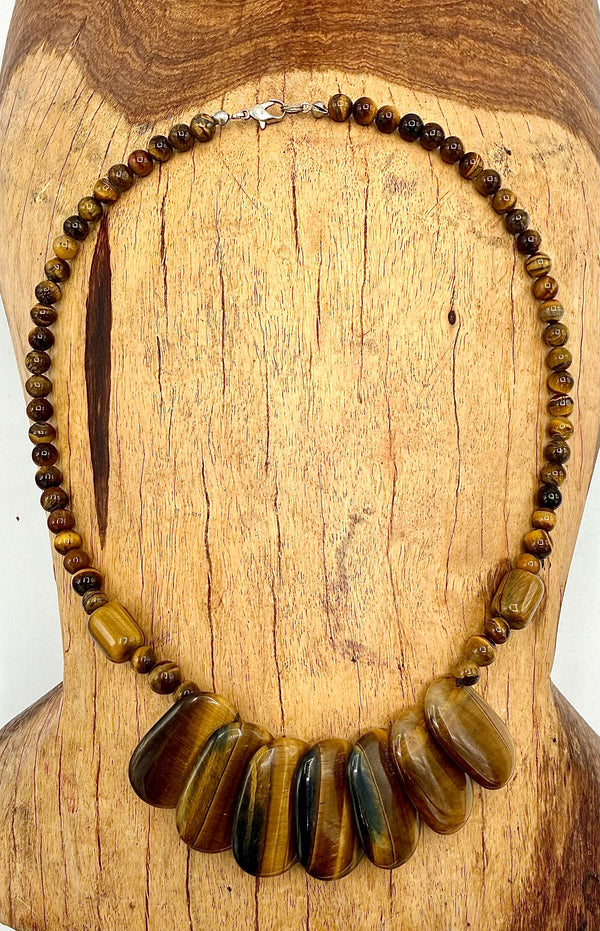 Brown Tiger Eye necklace featuring polished tiger eye beads on a string, crafted by STICS and STONES.