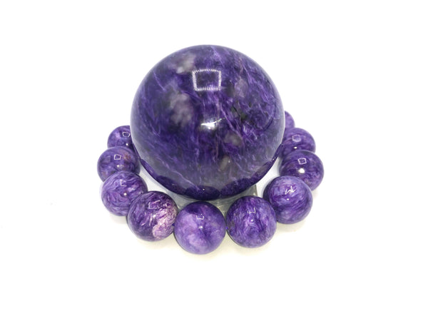Charoite bracelet from STICS and STONES featuring polished purple gemstone beads on an elastic band.