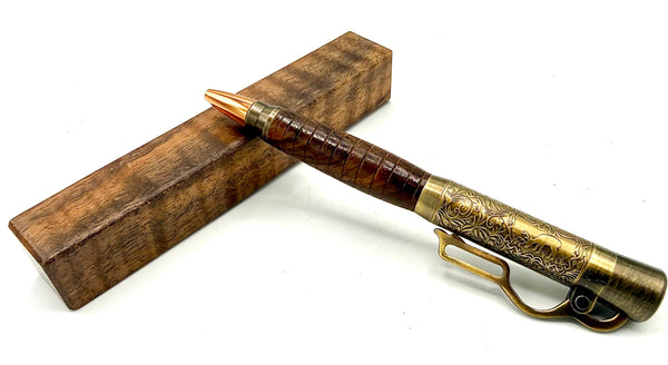 Hand-turned marble Claro walnut pen by STICS and STONES, showcasing smooth wood grain and elegant pen design.