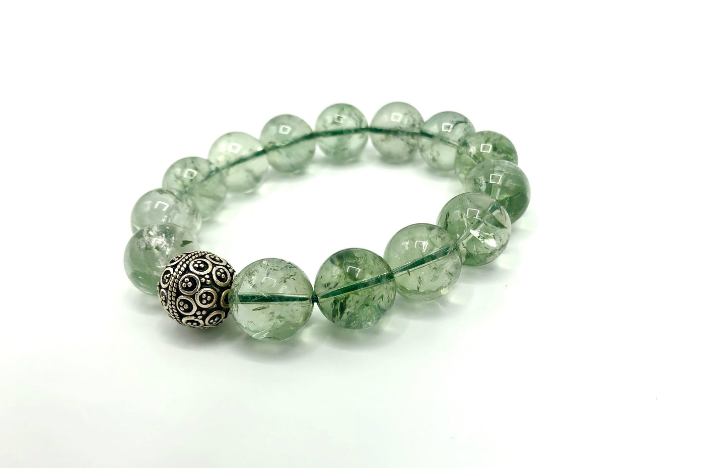 Green Amethyst bracelet by STICS and STONES featuring polished green gemstone beads on an elegant stretch band.