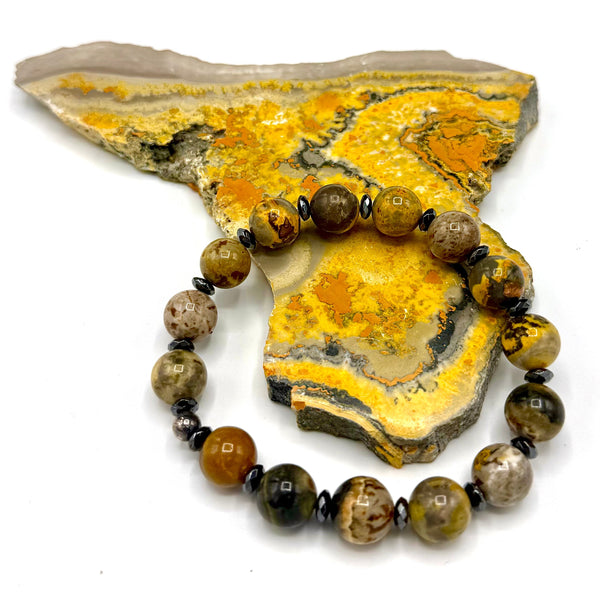 Bumble Bee Jasper bracelet by STICS and STONES featuring polished, colorful gemstone beads on an elastic band.