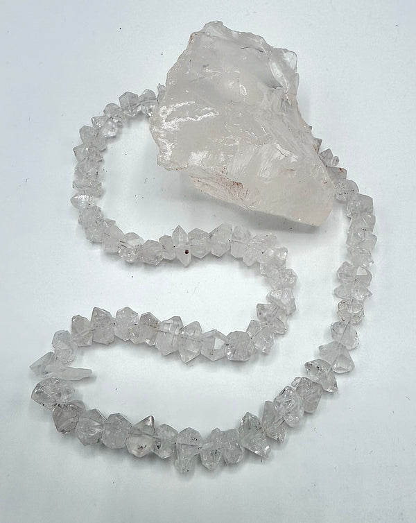 Herkimer Diamond Necklace by STICS and STONES featuring a sparkling cluster of Herkimer diamonds on a delicate chain.