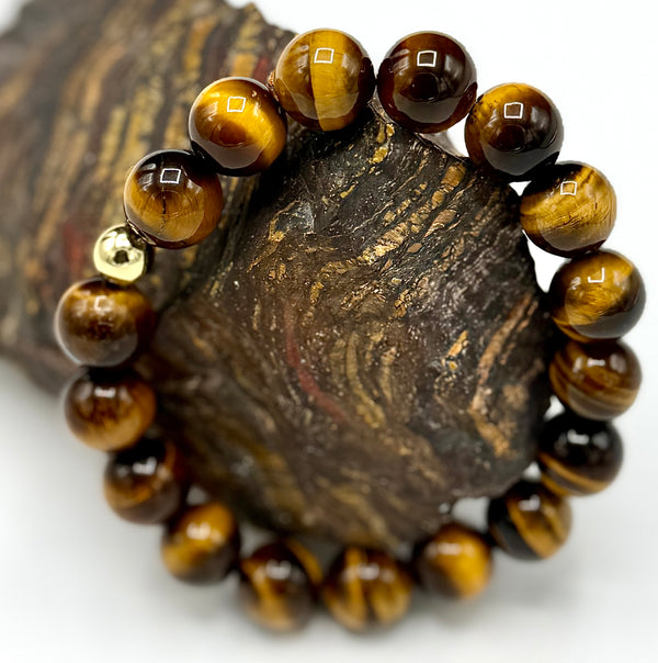 Tiger Eye bracelet from STICS and STONES featuring polished beads and a sleek, stylish design for everyday wear.