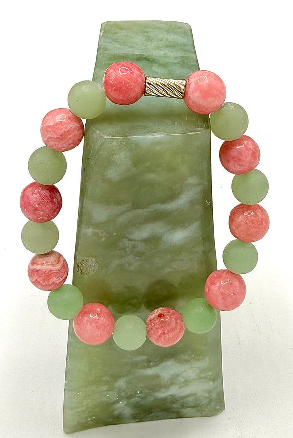 Green Aventurine and Rhodochrosite bracelet featuring polished gemstones on a stretch cord, handcrafted by STICS and STONES.