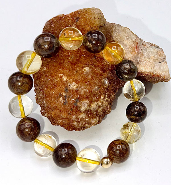 Bronzite and citrine beaded bracelet featuring natural stones and a silver clasp, handcrafted by STICS and STONES.