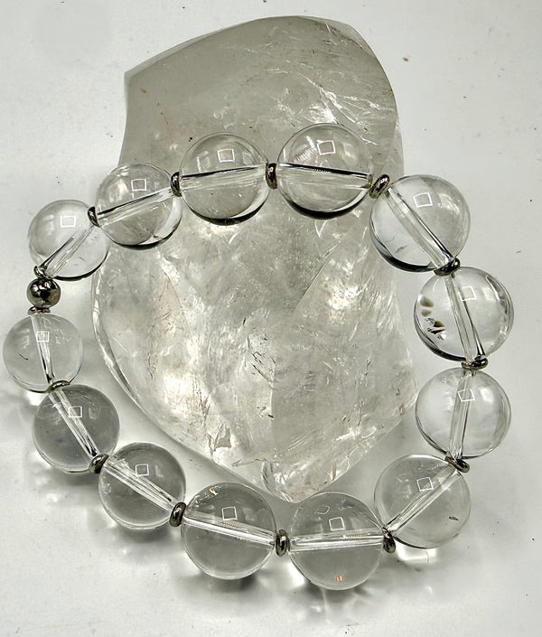 Clear Quartz bracelet from STICS and STONES featuring polished, translucent stones on an elastic band.