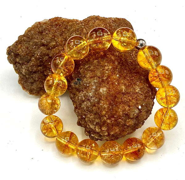 Dark citrine bracelet by STICS and STONES featuring polished citrine stones on a delicate bracelet chain.