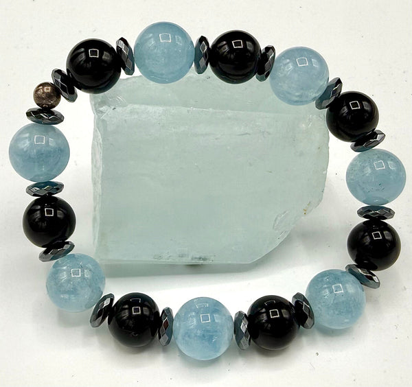 Aquamarine and onyx bracelet with alternating blue and black beads, handcrafted by STICS and STONES.