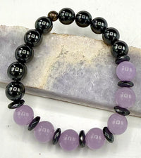 Lavender jade and hematite bracelet featuring polished beads, stylish jewelry piece by STICS and STONES.