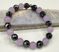 Lavender Jade and Hematite bracelet by STICS and STONES featuring smooth lavender jade beads and shiny hematite accents.