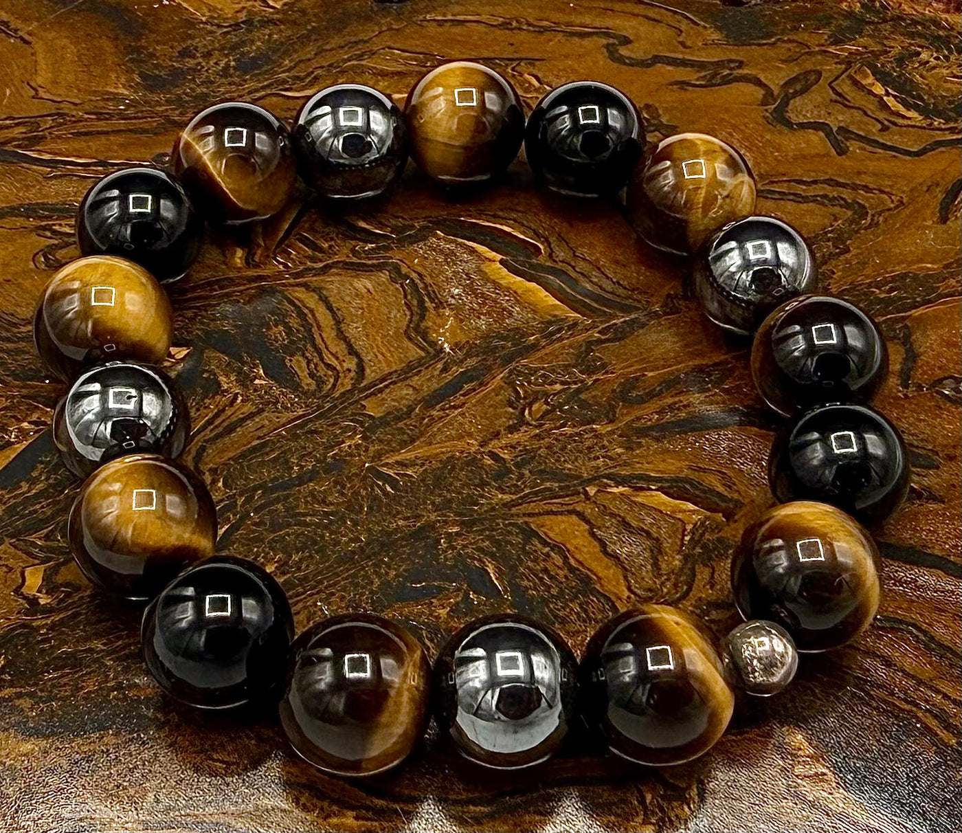 Brown Tiger Eye and Hematite bracelet featuring polished beads, crafted by STICS and STONES.