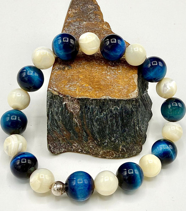 Blue tiger eye and pearl bracelet from STICS and STONES featuring polished beads on a delicate string.