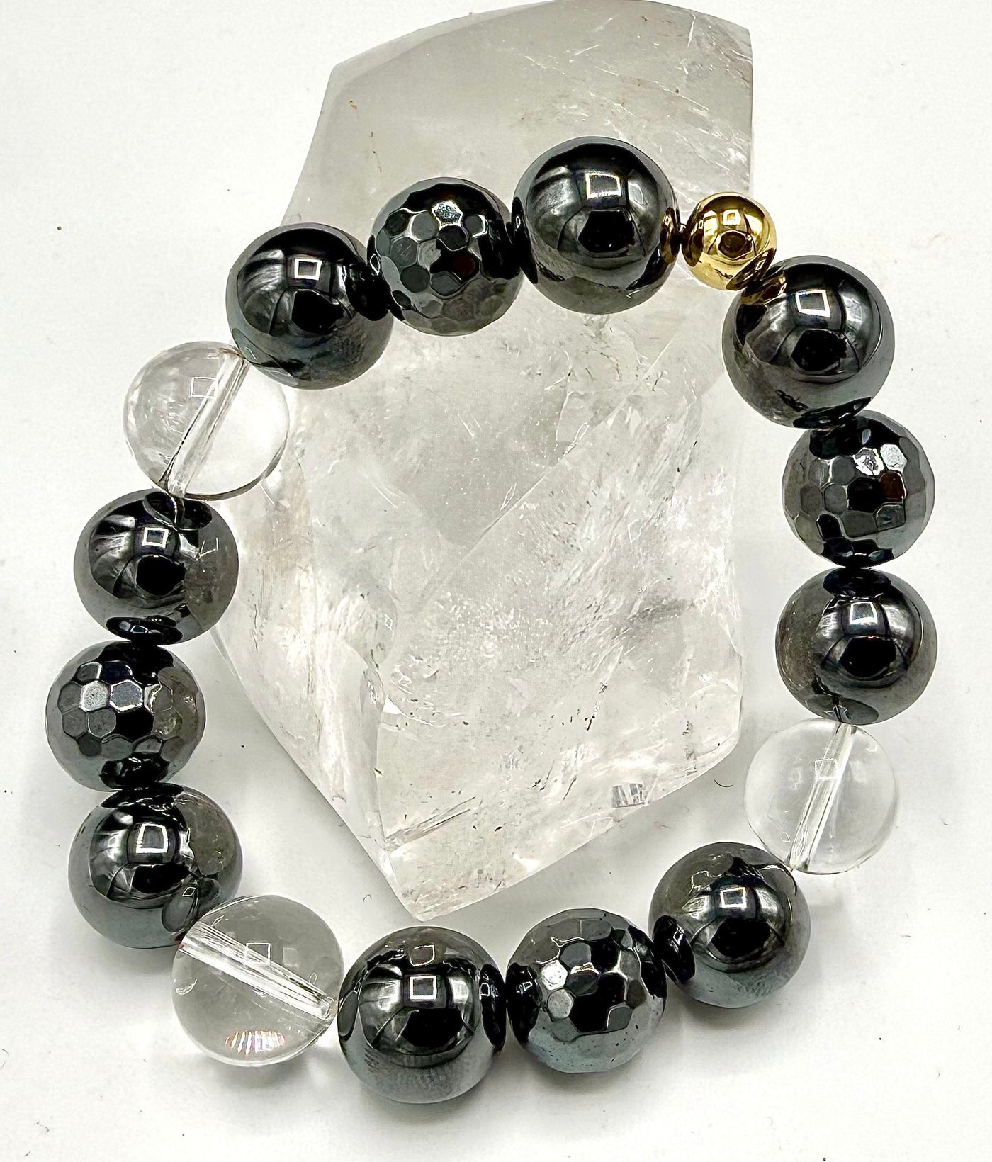 Hematite and quartz bracelet featuring polished black hematite and clear quartz beads, stylish jewelry by STICS and STONES.