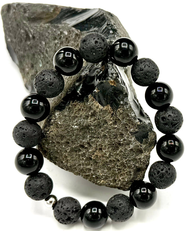 Lava rock and onyx bracelet by STICS and STONES featuring black volcanic stones and polished onyx beads.