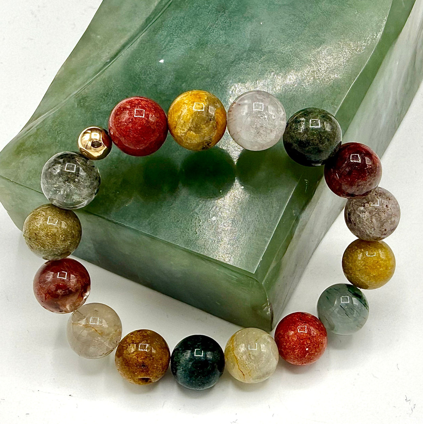 Lodalite bracelet by STICS and STONES featuring polished Lodalite stones on a silver-tone bracelet.