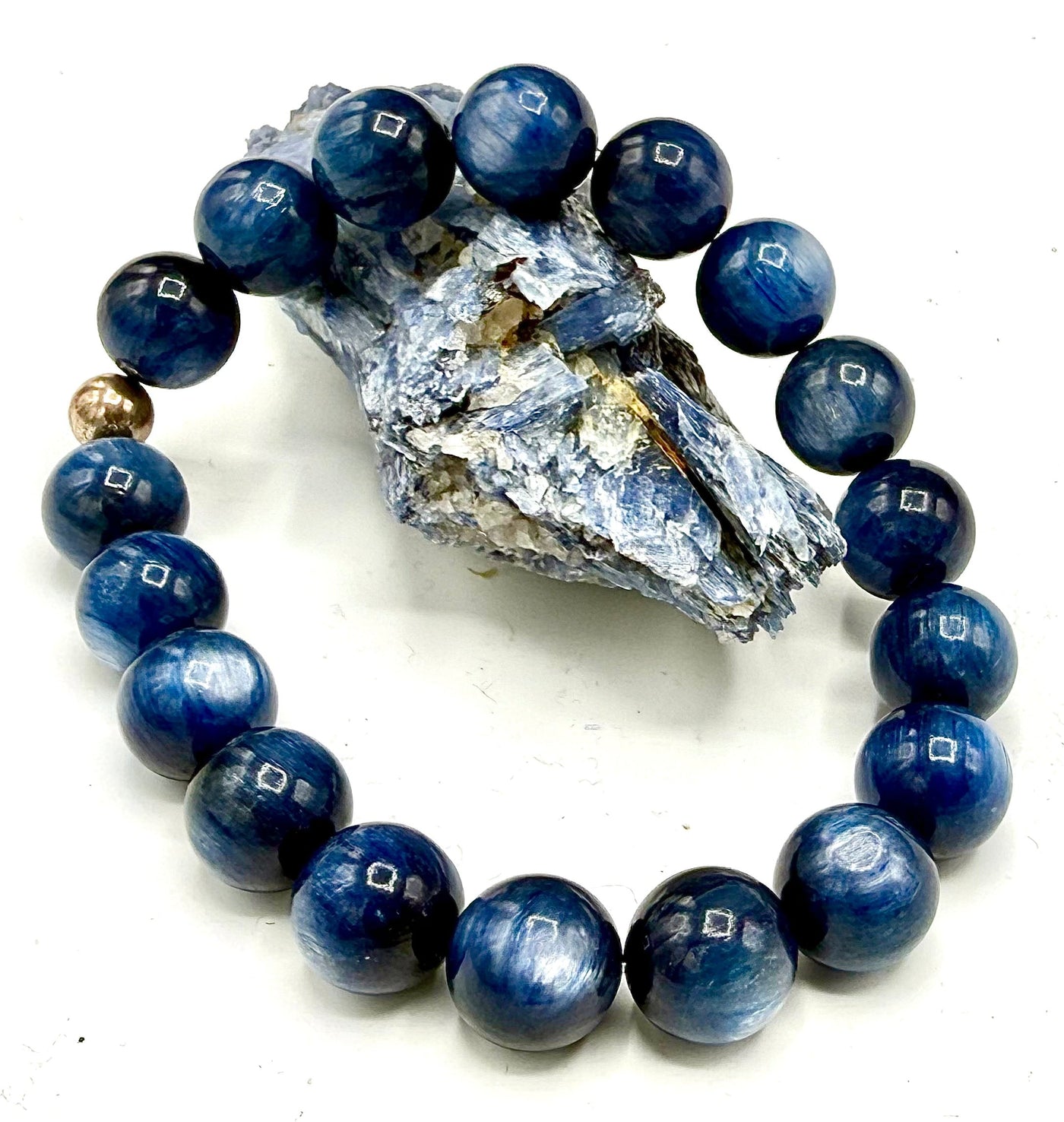 Blue Kyanite bracelet featuring polished stones on a stretch band by STICS and STONES.