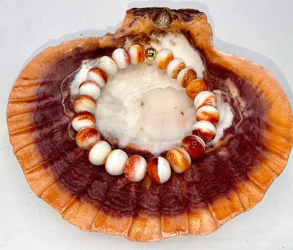 Orange and white spiny oyster shell bracelet by STICS and STONES featuring natural stone beads and a stylish design.