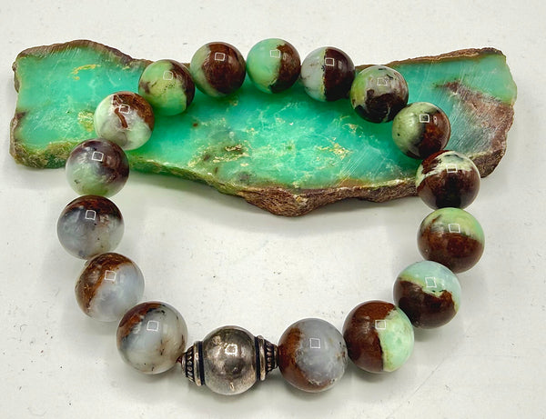 Chrysocolla bracelet featuring vibrant blue-green stones on a string, crafted by STICS and STONES.