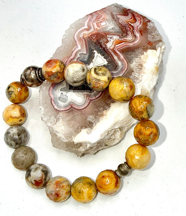 Crazy-laced agate bracelet with silver beads from STICS and STONES, featuring vibrant, patterned stone and shiny silver accents.