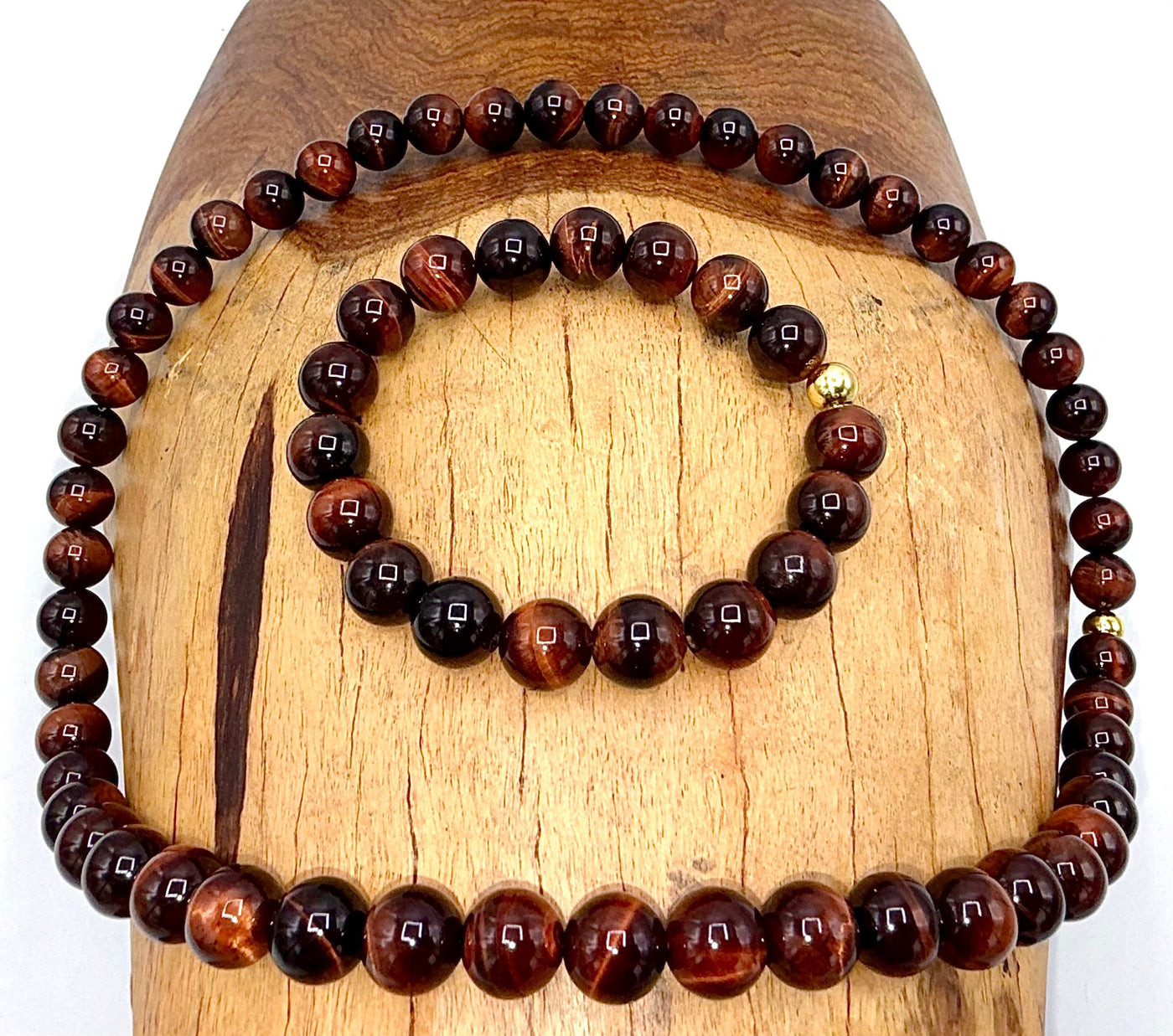 Red Tiger Eye jewelry set with matching necklace and bracelet from STICS and STONES, showcasing polished stones and elegant design.