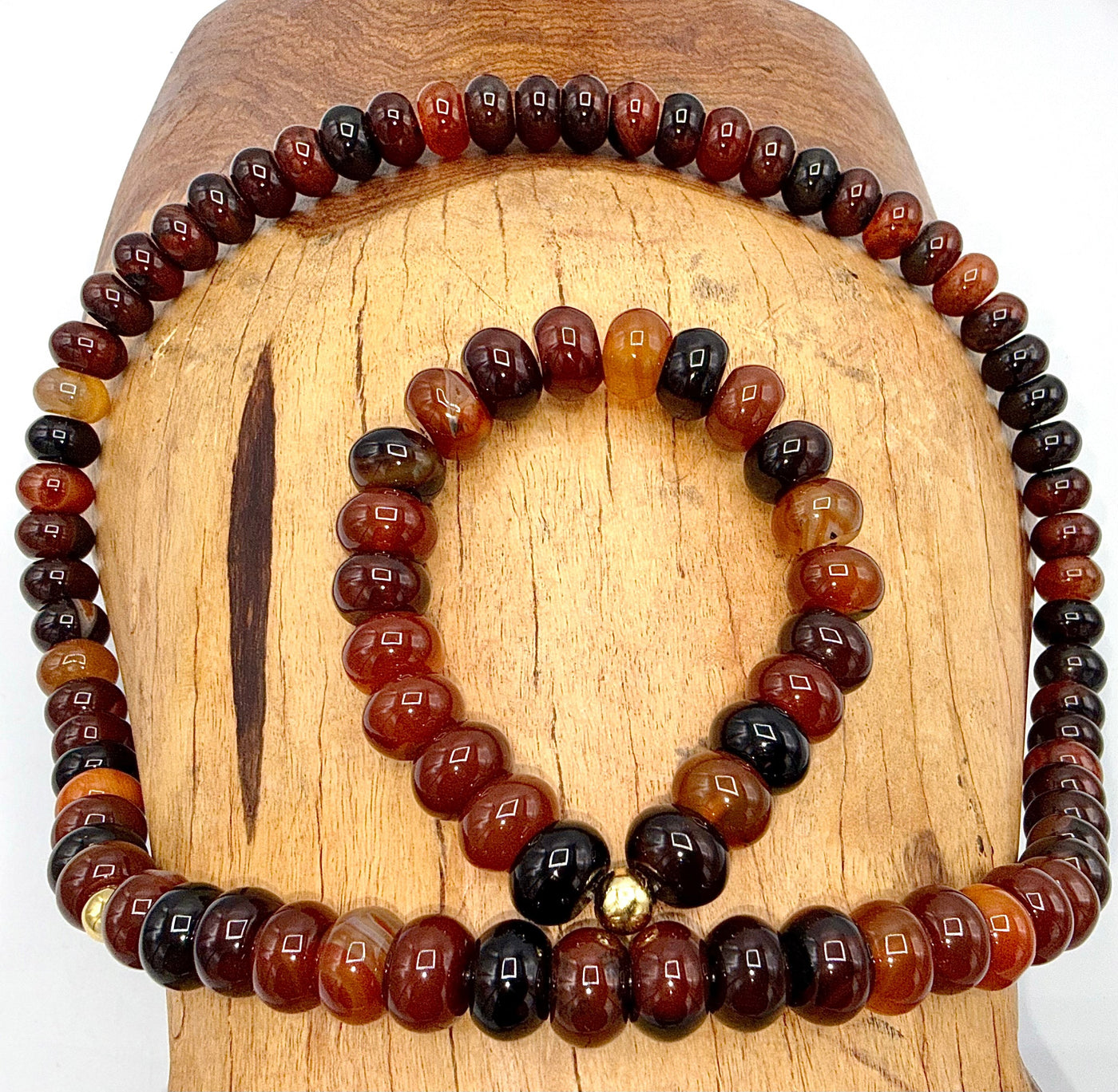 Carnelian jewelry set with matching necklace and bracelet featuring vibrant orange-red stones, by STICS and STONES.