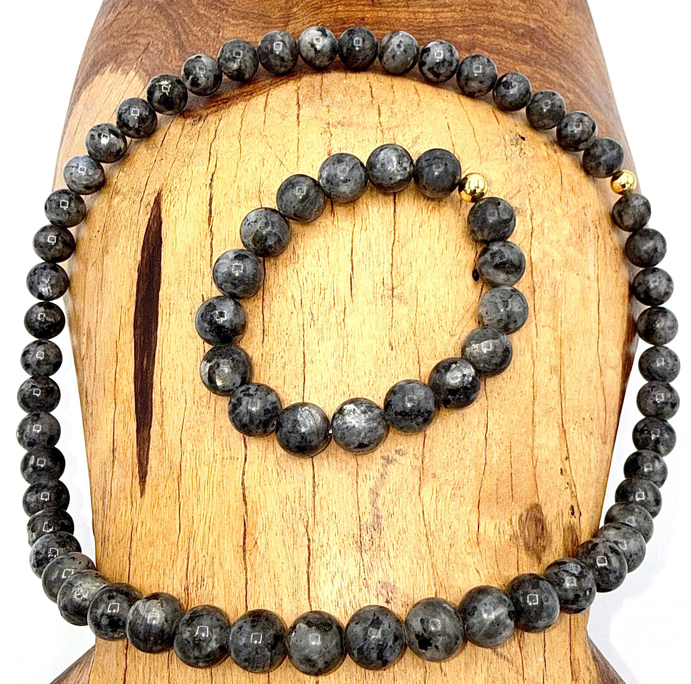 Labradorite jewelry set with necklace and bracelet featuring iridescent stones, crafted by STICS and STONES.
