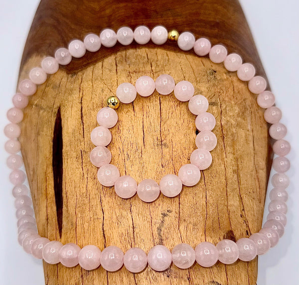 Rose quartz jewelry set featuring a necklace and bracelet with pink gemstones from STICS and STONES.