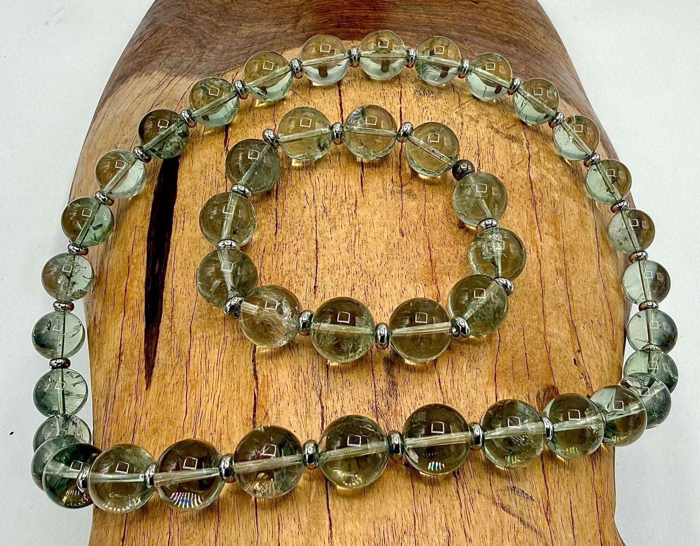 Green amethyst jewelry set featuring a necklace and bracelet with polished green amethyst gemstones, crafted by STICS and STONES.