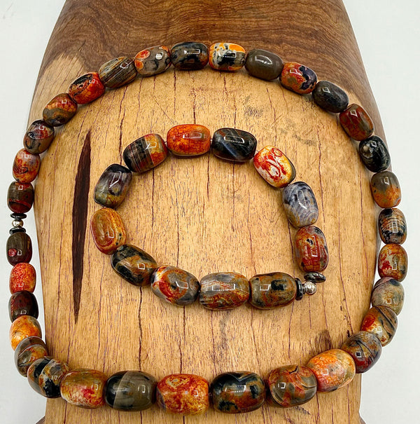 Black, red, and orange agate jewelry set featuring a necklace and bracelet from STICS and STONES.