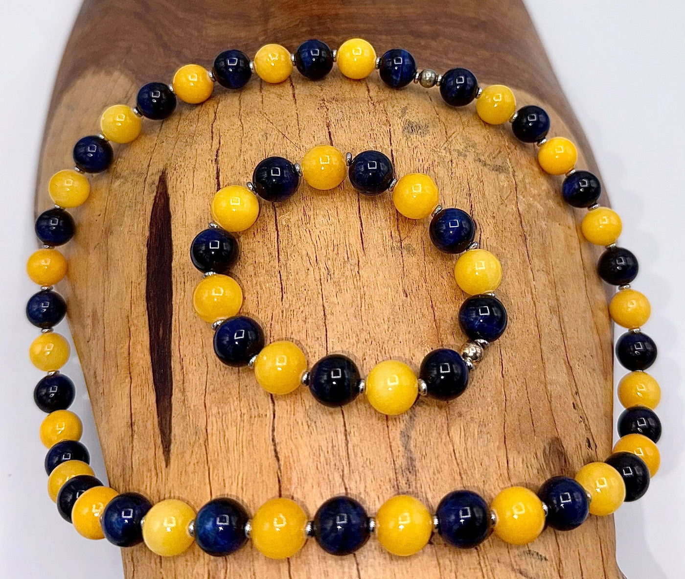 Blue tiger eye and yellow calcite jewelry set featuring a necklace and bracelet with natural semi-precious stone beads.