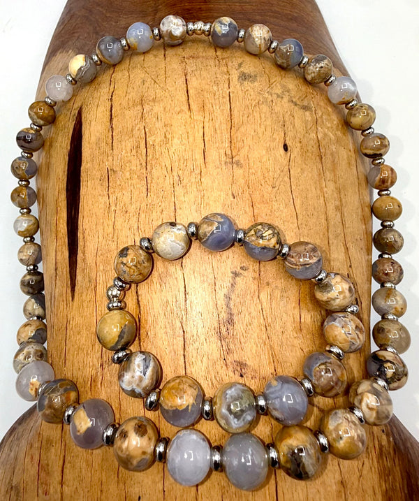 Chalcedony skinned necklace and bracelet jewelry set featuring polished blue gemstones from STICS and STONES.
