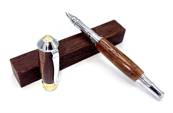 Hand-turned pheasant wood pen by STICS and STONES with a smooth, polished finish and elegant design.