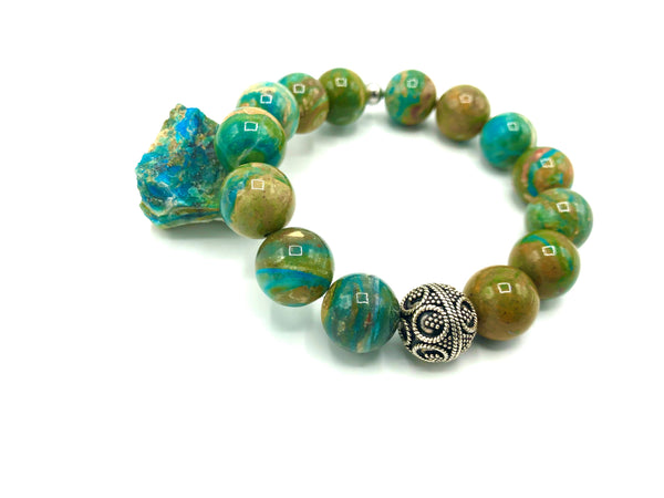 Peruvian Opal bracelet featuring vibrant, smooth gemstone beads from STICS and STONES, stylish jewelry accessory.