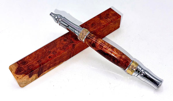 Hand-turned Amboyna Burl pen by STICS and STONES, showcasing rich wood grain and elegant craftsmanship.