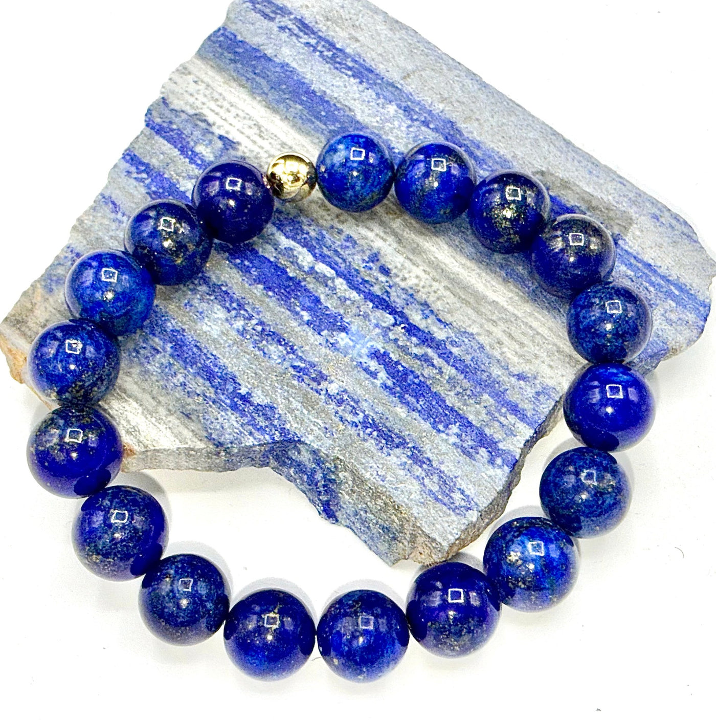 Blue Lapis Lazuli bracelet with polished beads from STICS and STONES, featuring a stylish and elegant design.